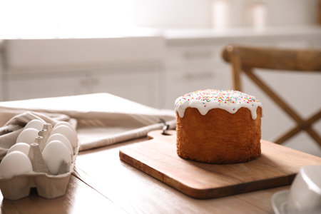 Traditional Easter cake on table in kitchen. Space for textの写真素材