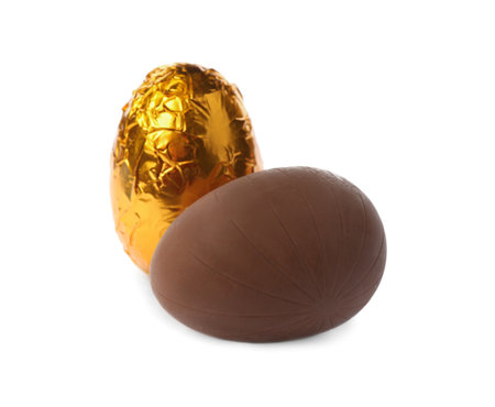 Two sweet chocolate eggs on white backgroundの写真素材