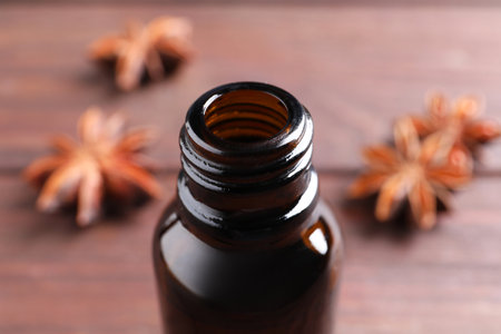 Anise essential oil in bottle on table, closeupの写真素材