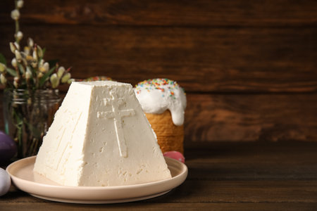 Traditional cottage cheese Easter paskha on wooden table, space for textの写真素材