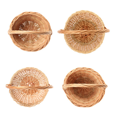 Set with wicker baskets on white background, top viewの写真素材