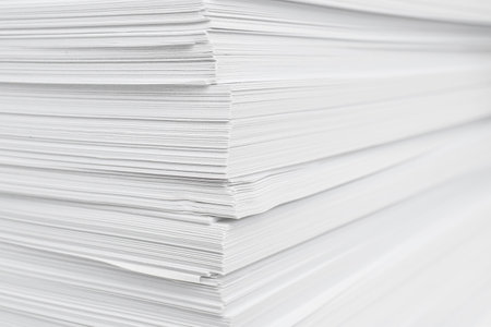 Stack of white paper sheets, closeup viewの写真素材