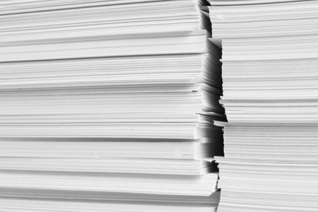 Stacks of white paper sheets, closeup view
