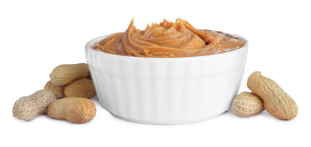 Delicious peanut butter in bowl on white backgroundの写真素材