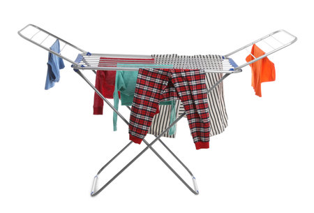Modern drying rack with clothes on white backgroundの写真素材