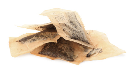 Many used tea bags on white backgroundの写真素材