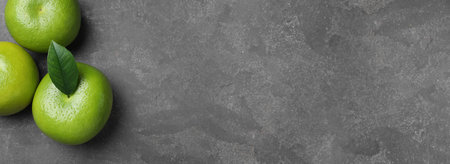 Fresh ripe sweeties on gray table, flat lay with space for text. banner designの写真素材