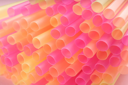 Heap of colorful plastic straws for drinks, closeupの写真素材