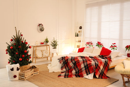 Beautiful decorated Christmas tree in the bedroom. interior designの写真素材
