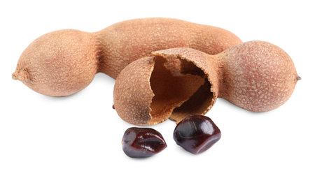 Delicious ripe tamarinds on white background. exotic fruitsの写真素材