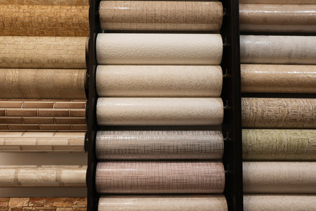 Assortment of stylish wall papers on display in shopの写真素材