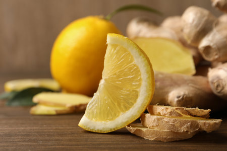 Fresh lemon and ginger on wooden table, closeupの写真素材