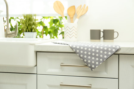 Cotton towel on countertop in modern kitchenの写真素材