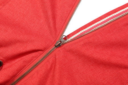 Red jacket with zipper on white background, top viewの写真素材