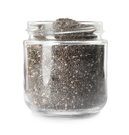 Glass jar with chia seeds isolated on whiteの写真素材