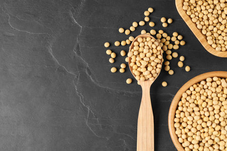 Soy on black table, flat lay. Space for textの写真素材