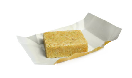 Unwrapped bouillon cube on white background. Broth concentrateの写真素材