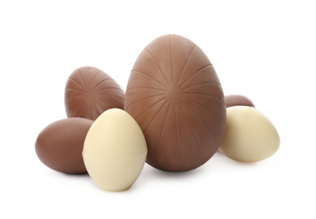 Many sweet chocolate eggs on white backgroundの写真素材