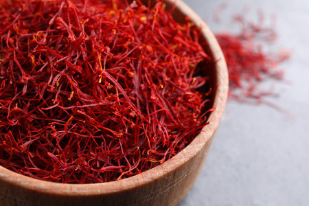 Dried saffron in bowl on table, closeupの写真素材