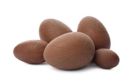 Many sweet chocolate eggs on white backgroundの写真素材