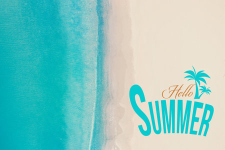 hello summer. Beautiful sandy beach and sea, top viewの写真素材
