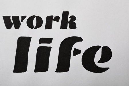 Work, Life written on white background, top view. balance conceptの写真素材