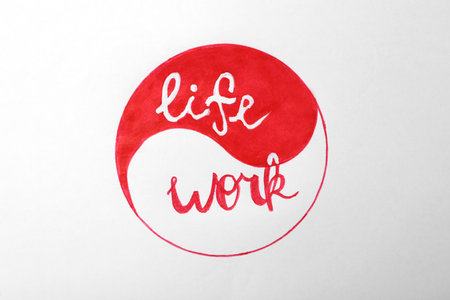 Yin Yang sign with words Work and Life on white background. balance conceptの写真素材
