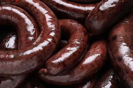 Tasty blood sausages as background, closeup viewの写真素材