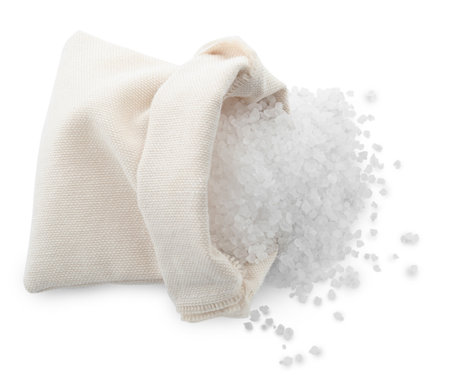 Natural salt and bag on white backgroundの写真素材