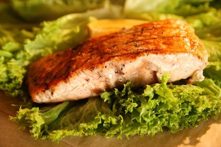 Tasty freshly cooked salmon served on table, closeupの写真素材