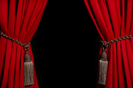 Open elegant red front curtains on black background. Space for textの写真素材