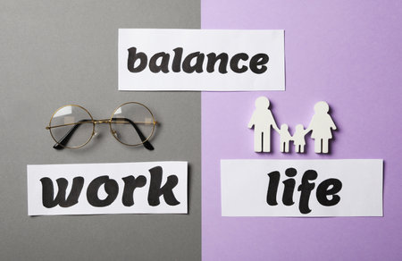 Family figures, eyeglasses and words Balance, Life, Work on color background, flat layの写真素材