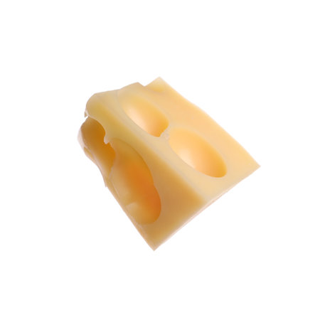 Piece of cheese with holes isolated on whiteの写真素材