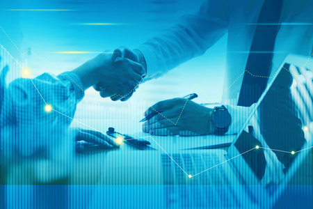Growth graph illustration and business people shaking hands in office, closeup. investment conceptの写真素材