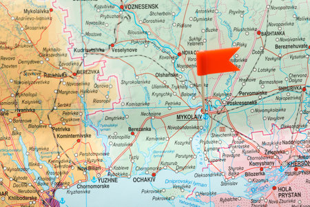 MYKOLAIV, UKRAINE - NOVEMBER 09, 2020: Mykolaiv city marked with push pin on map of Ukraine, closeupのeditorial素材