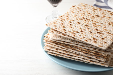 Plate with stack of matzos on white tableの写真素材