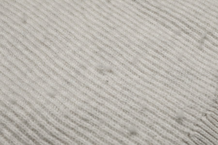 Lightcloth with bobbles, closeup. Before use of fabric shaver