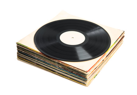Stack of vintage vinyl records on white backgroundの写真素材