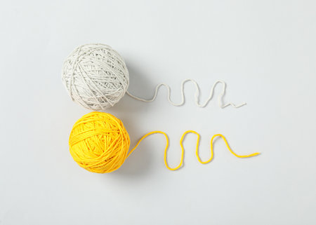 Soft colorful woolen yarns on white background, flat layの写真素材