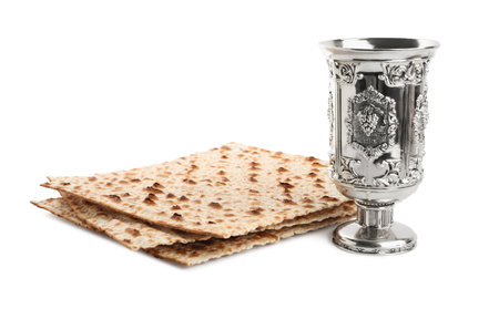 Traditional matzos and wine on white background