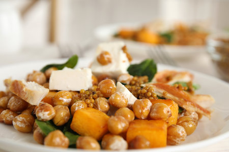 Delicious fresh chickpea salad on plate, closeupの写真素材