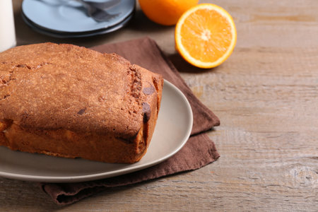 Fresh delicious cake served on wooden table, closeup. Space for textの写真素材