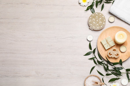 Flat lay composition with spa products on wooden table. Space for textの写真素材