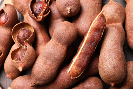 Pile of delicious ripe tamarinds, closeup viewの写真素材