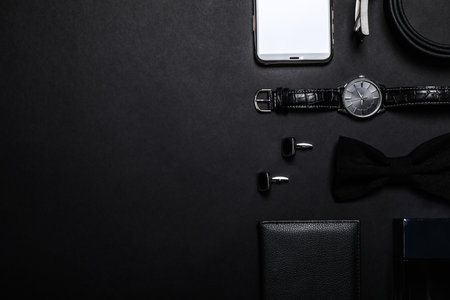 Flat lay composition with male accessories on black background, space for textの写真素材