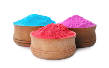 Colorful powder dyes in bowls on white background. Holi Festivalの写真素材