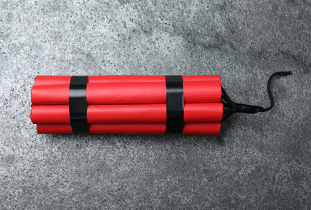 Dynamite bomb on gray table, top viewの写真素材