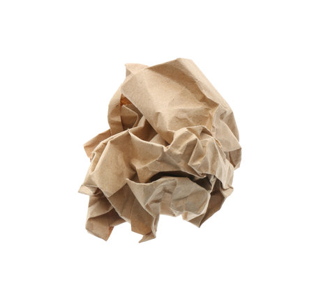 Crumpled sheet of kraft paper isolated on white, top viewの写真素材