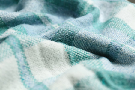Turquoise woolen fabric as background, closeup viewの写真素材