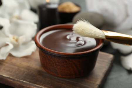 Cosmetic product for spa body wraps on black background, closeupの写真素材